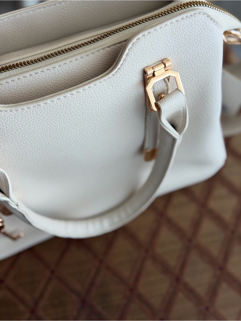 Elegant Cream Structured Top-Handle Handbag with Gold Hardware